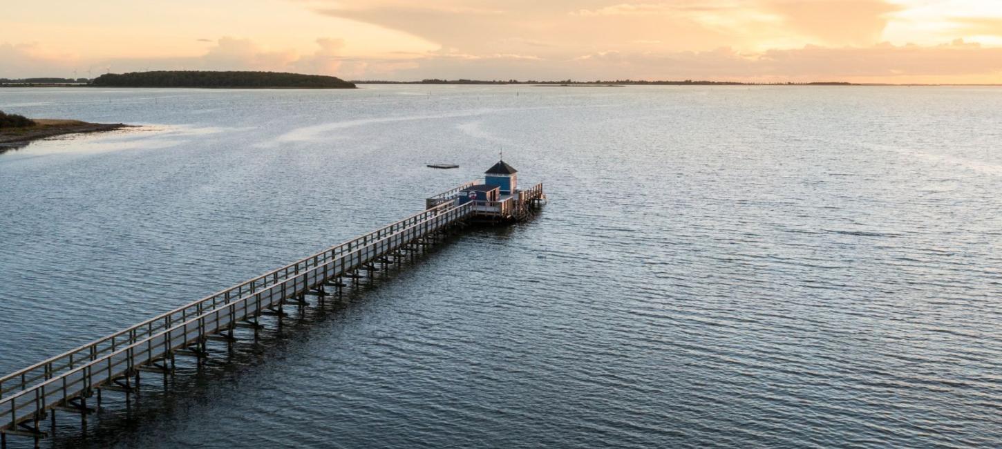 Solnedgang over Hestehovedet Badebro